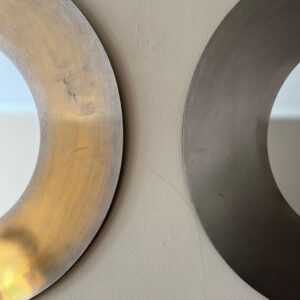 Pair of circular nickel on brass mirrors c.1970’s