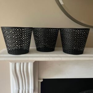 A set of three pierced metal pots in the manner of Mathieu Mategot. French c.1955